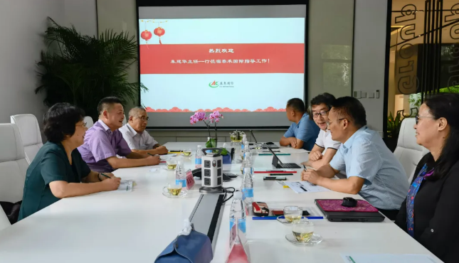 上海市农业技术推广服务中心朱建华主任一行光临win必赢国际领导工作